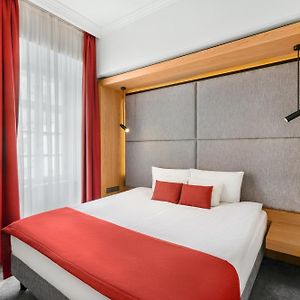 Kamer met een Queen Size Bed